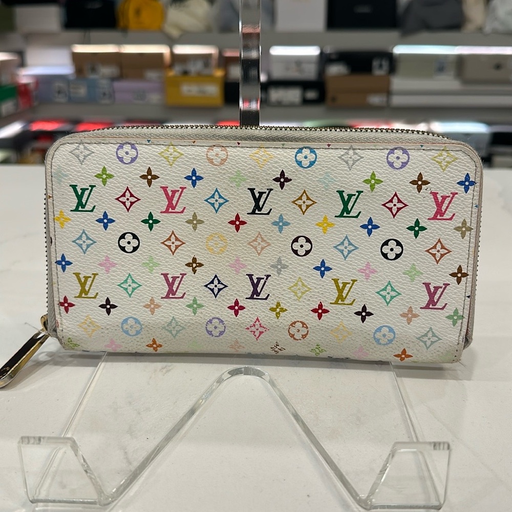 Louis Vuitton X Takashi Murakami 2003 zippy wallet.
